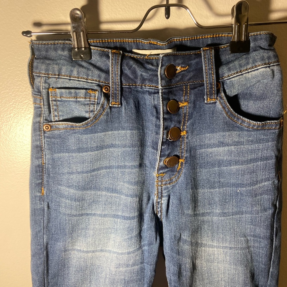 High waisted button-fly skinny jeans